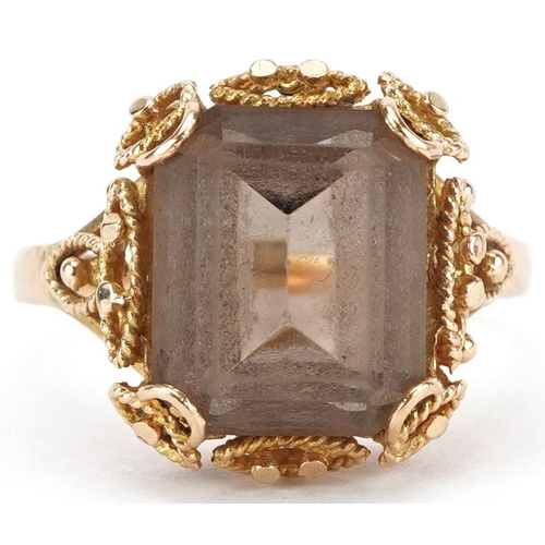 2236 - Unmarked gold smoky quartz ring with ornate pierced setting, tests as 9ct gold, the quartz approxima... 