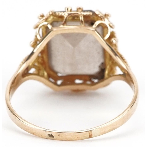 2236 - Unmarked gold smoky quartz ring with ornate pierced setting, tests as 9ct gold, the quartz approxima... 