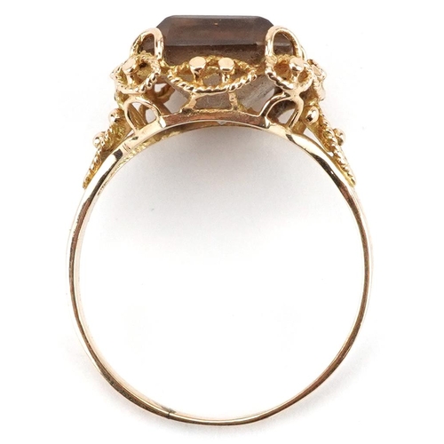 2236 - Unmarked gold smoky quartz ring with ornate pierced setting, tests as 9ct gold, the quartz approxima... 