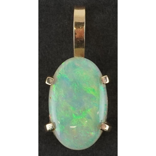 2475 - Unmarked gold cabochon opal pendant, 2cm high, 1.6g