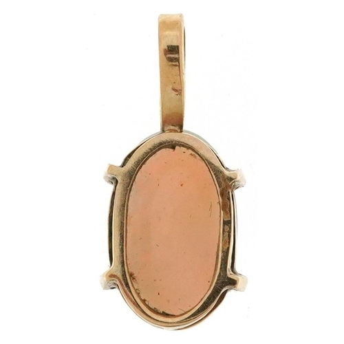 2475 - Unmarked gold cabochon opal pendant, 2cm high, 1.6g