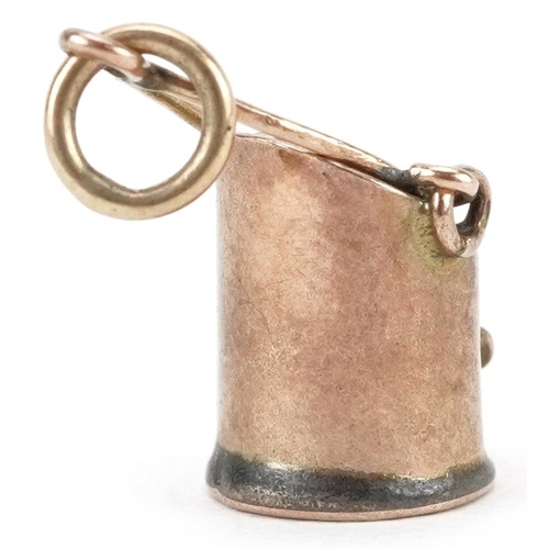 2618 - 9ct gold charm in the form of a coal bucket with swing handle, 1.8cm high, 0.9g