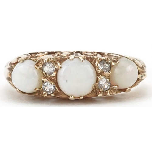 2149 - 9ct gold cabochon opal and clear stone ring with ornate scrolled setting, size N, 2.1g