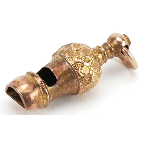 2262 - Unmarked gold charm in the form of a whistle, tests as 9ct gold, 3.2cm high, 3.1g