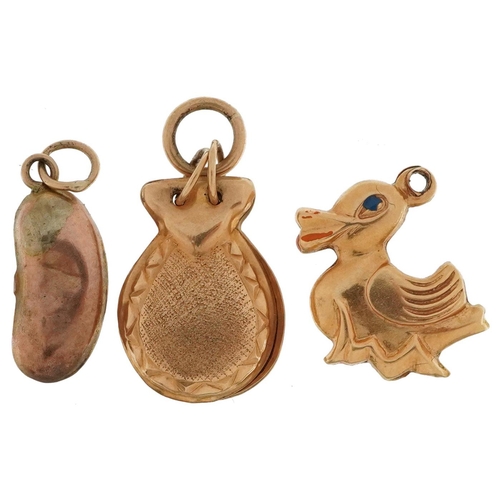 2570 - Three gold charms comprising 9ct rose gold kidney bean, unmarked gold maracas and an unmarked gold a... 