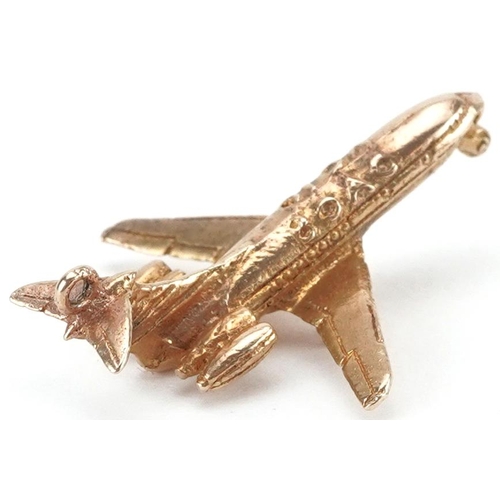 2079 - 9ct gold opening charm in the form of an aeroplane, 2.9cm in length, 3.3g