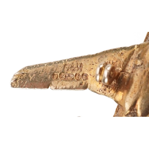 2079 - 9ct gold opening charm in the form of an aeroplane, 2.9cm in length, 3.3g