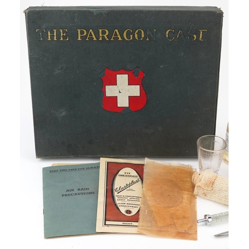 646 - Vintage Paragon Cast First Aid outfit housing various implements, 29cm wide