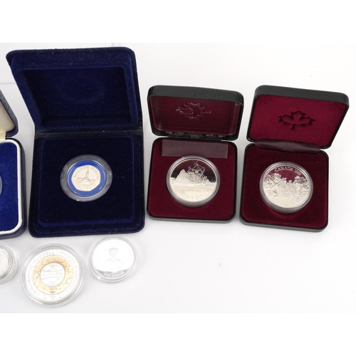 1665 - Nine silver proof coins, some with cases, including 1990 silver proof five pence two coins set, two ... 