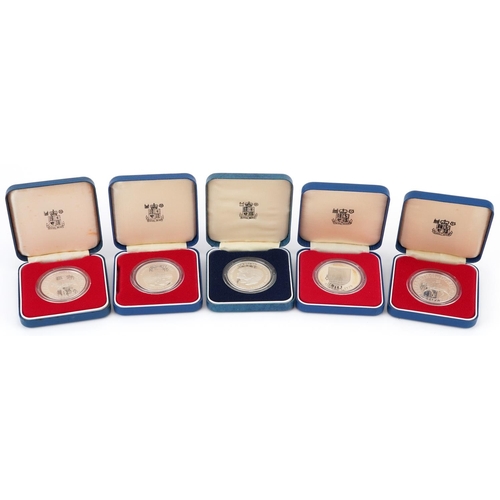 1668 - Five 1977 silver proof commemorative crowns by The Royal Mint with fitted cases