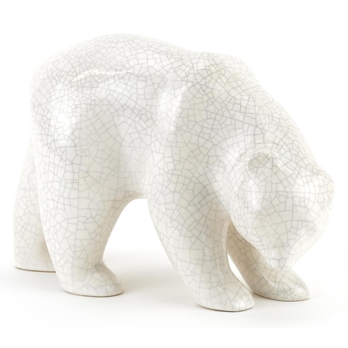 115 - French Art Deco pottery polar bear having a white crackle glaze, 23cm in length