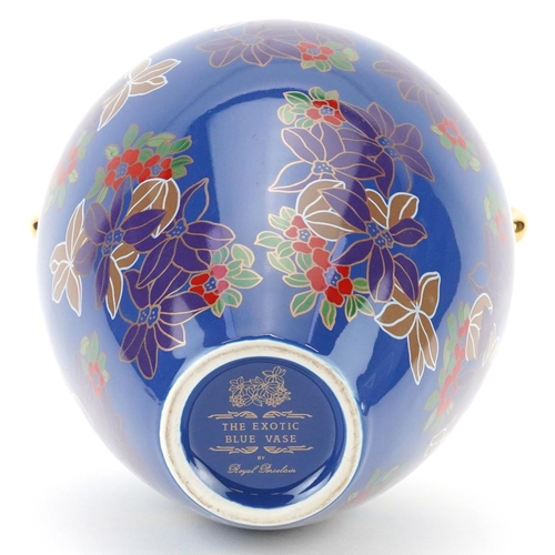 1488 - Royal porcelain exotic blue vase with twin handles, 25cm high