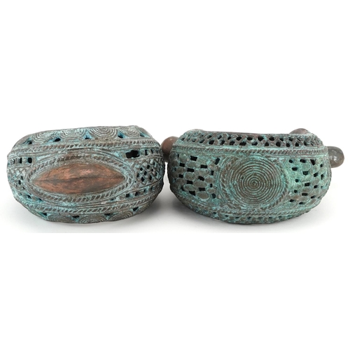 70 - Two West African tribal interest verdigris copper open cuffs, the largest 17.5cm high