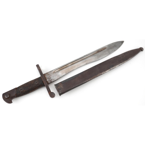  Spanish military World War II Bolo bayonet with scabbard and steel blade numbered 6215, 39cm in leng... 