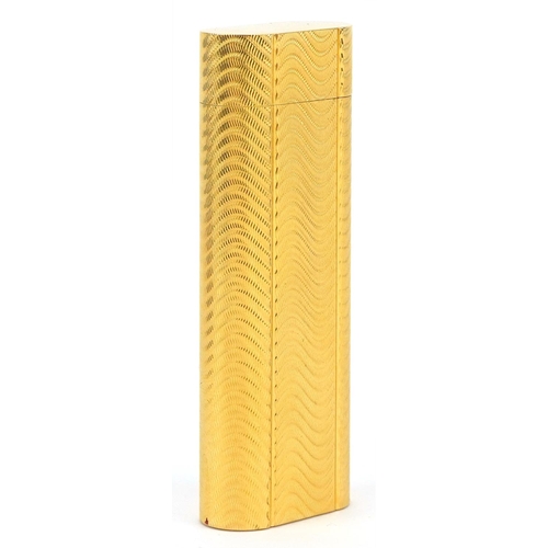 36 - Cartier, gold plated French engine turned pocket lighter with box numbered D24339, 7cm high