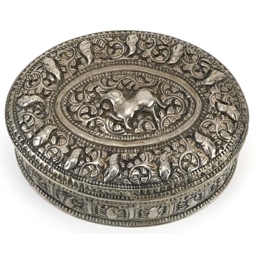 201 - Anglo Indian white metal box and cover profusely embossed and engraved with wild animals and foliage... 