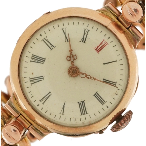 2525 - 9ct gold ladies manual wind wristwatch having enamelled dial with Roman numerals and 9ct rose gold e... 