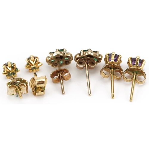 2581 - Three pairs of 9ct gold stud earrings set with stones including emerald, diamond and amethyst, the l... 