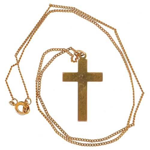 2495 - 9ct gold floral engraved cross pendant on a yellow metal necklace, 3cm high and 42cm in length, the ... 