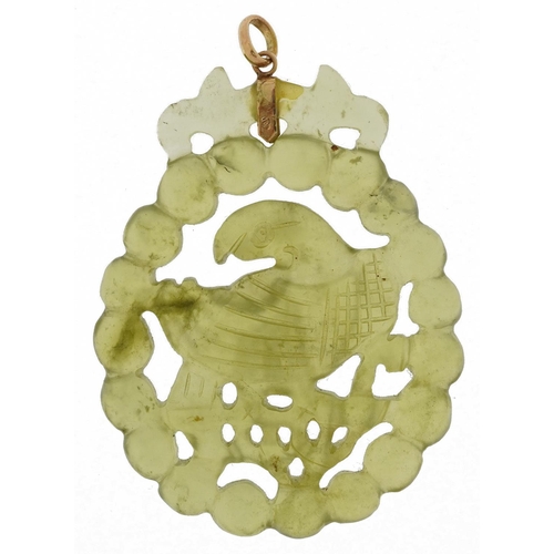 2634 - Chinese green glass pendant depicting a bird on a branch with 9ct gold mount, 5.2cm high