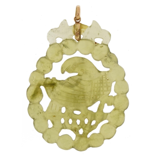 2634 - Chinese green glass pendant depicting a bird on a branch with 9ct gold mount, 5.2cm high