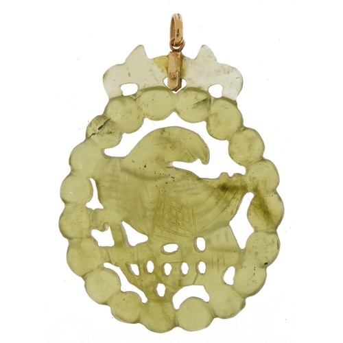 2634 - Chinese green glass pendant depicting a bird on a branch with 9ct gold mount, 5.2cm high