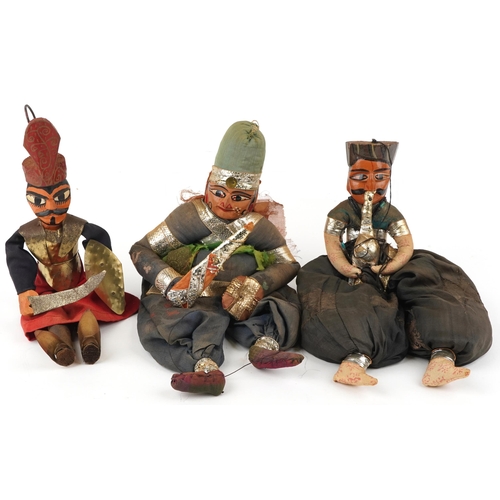 1510 - Three Asian hand painted carved wood puppets wearing traditional dress, 49cm high