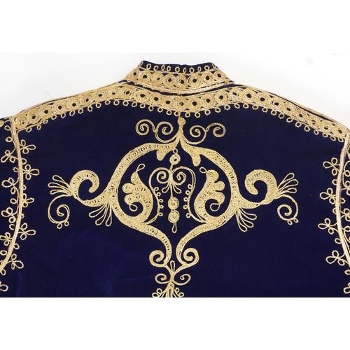 380 - Moroccan silk lined velvet kaftan embroidered with stylised foliage, 140cm high