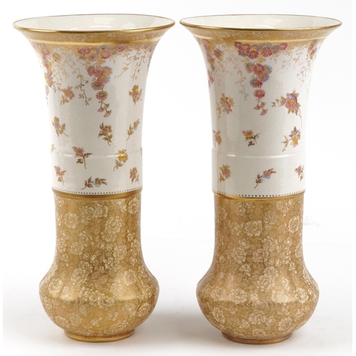 240 - Wedgwood, large pair of aesthetic vases gilded and decorated with flowers, factory marks and numbere... 