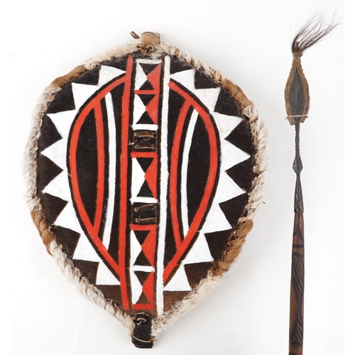 519 - African tribal interest Maasai spear and vellum shield, the largest 82.5cm in length