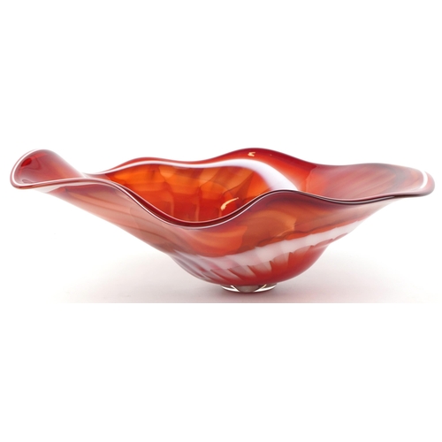 586 - Large red and green art glass centre bowl, indistinct etched marks to the base, 60cm wide