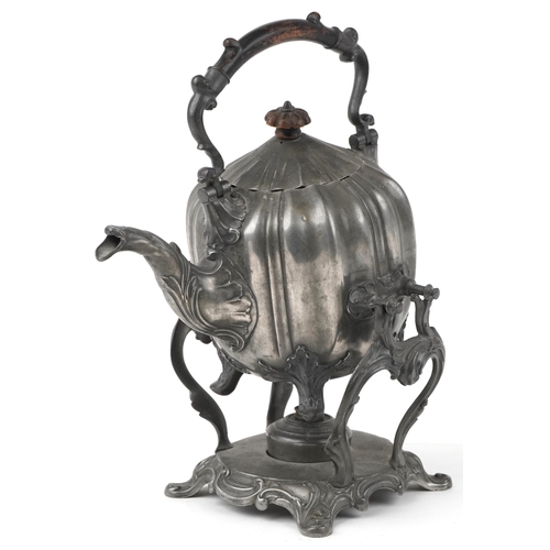 1416 - Victorian pewter teapot on stand with burner and ebonised handle, 30.5cm high excluding the swing ha... 