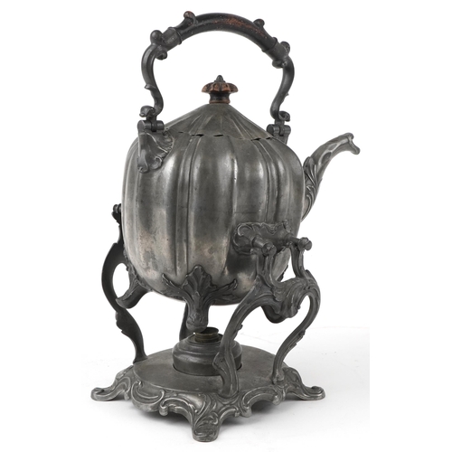 1416 - Victorian pewter teapot on stand with burner and ebonised handle, 30.5cm high excluding the swing ha... 