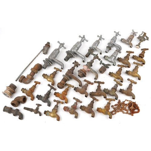 449 - Collection of early 20th century brass and chromed taps