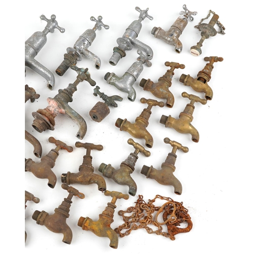 449 - Collection of early 20th century brass and chromed taps