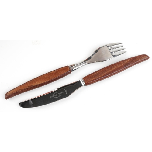 1136 - 1970s Bravingtons six place canteen of stainless steel cutlery with teak handles, the canteen 36.5cm... 