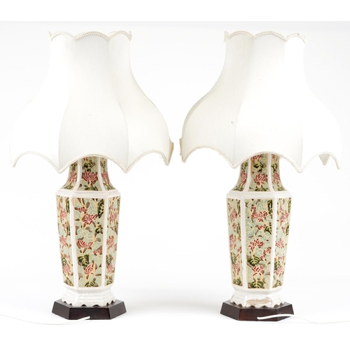 1407 - Large pair of Chinese hexagonal vase table lamps raised on hardwood stands with silk lined shades, t... 