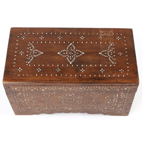 1024 - Asian hardwood trunk with mother of pearl foliate inlay, 25.5cm high, 45.5cm W x 24cm D