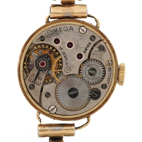 2238 - Omega, ladies 14ct gold manual wind wristwatch on a gold plated strap having silvered and subsidiary... 