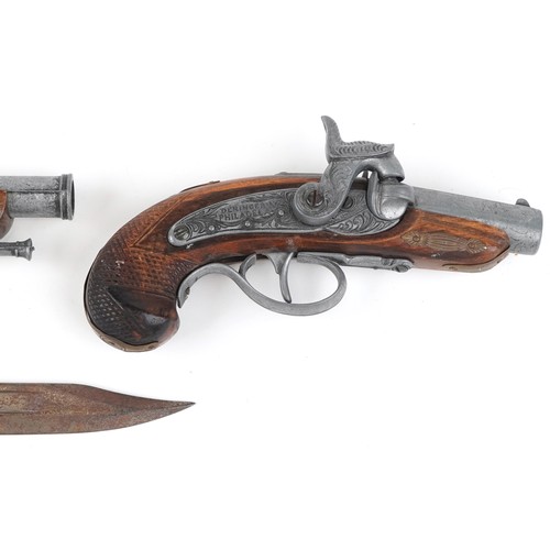 686 - Two decorative model pistols and a bayonet, 38cm in length