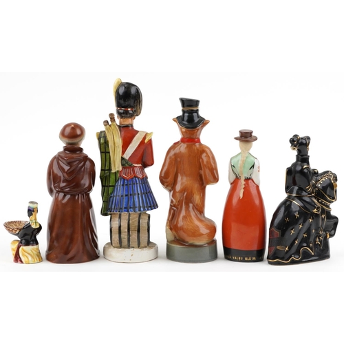 1125 - Six continental porcelain decanters in the form of figures and animals including James Beam in the f... 