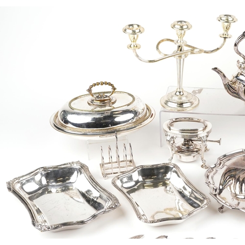 1459 - Silver plated sundry items including three branch candelabra, teapot on stand with burner and four s... 