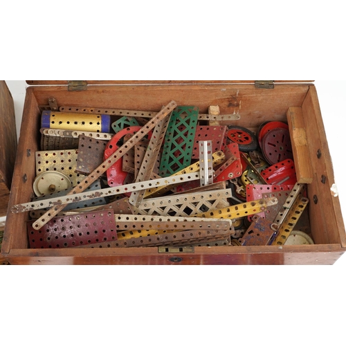  Collection of vintage Meccano and accessories arranged in two hardwood cases, one with various fitte... 