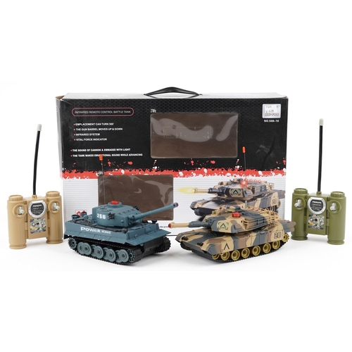 1594 - HQ Huanqi 1:24 scale remote controlled battle tanks with box