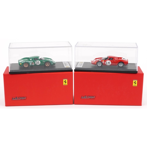 1559 - Two Looksmart 1:43 scale diecast model racing vehicles with boxes and display cases comprising Le Ma... 