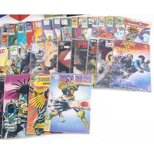  Large collection of predominantly vintage comics, some arranged in three folders, including Total Ca... 