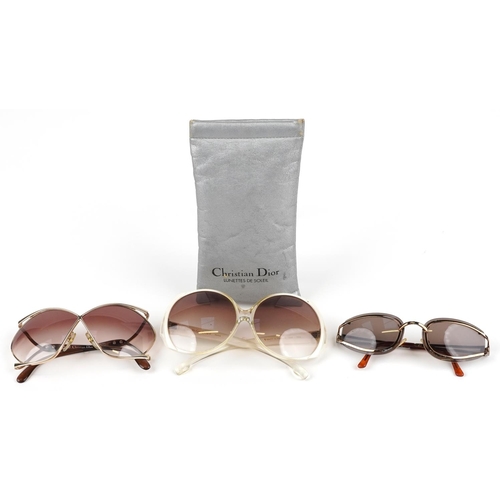 1293 - Three pairs of ladies sunglasses, comprising two Christian Dior, one with case and Yves Saint Lauren... 