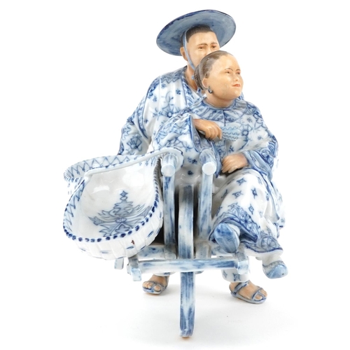 72 - 19th century European porcelain sweetmeat dish in the form of a Chinaman with rickshaw