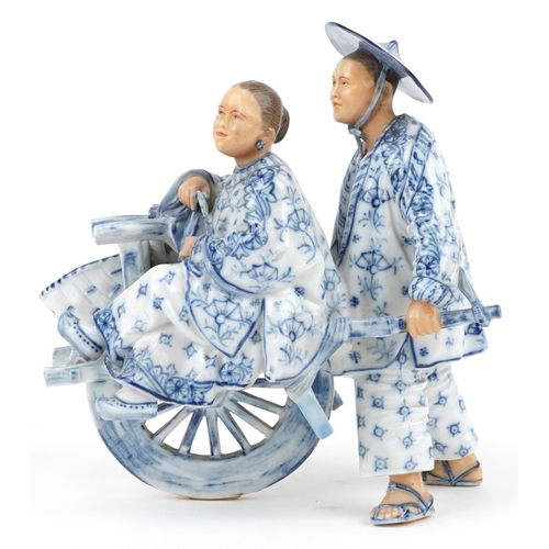 72 - 19th century European porcelain sweetmeat dish in the form of a Chinaman with rickshaw