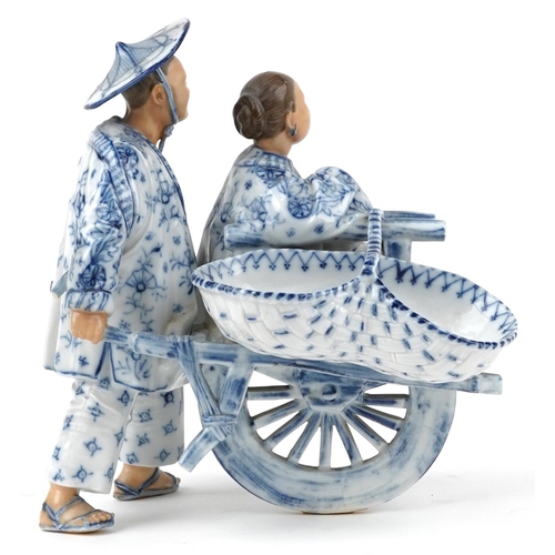 72 - 19th century European porcelain sweetmeat dish in the form of a Chinaman with rickshaw